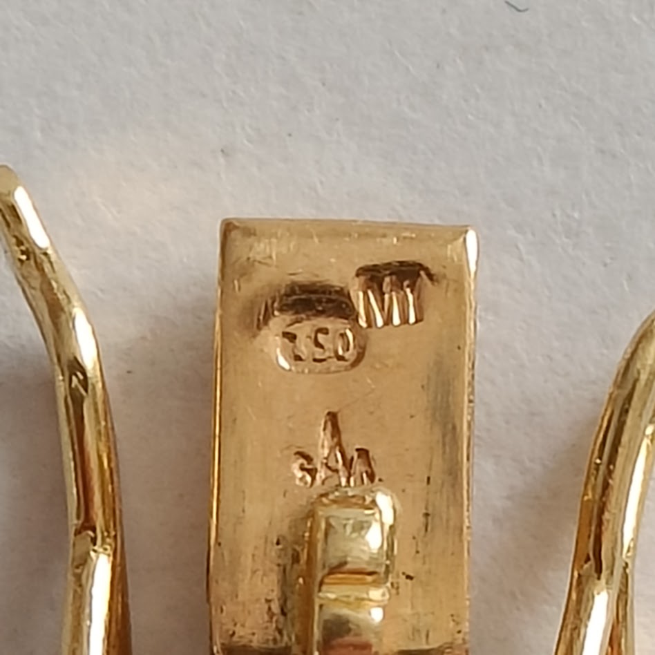 18k Gold Curb Link Bracelet with 4 Emerald