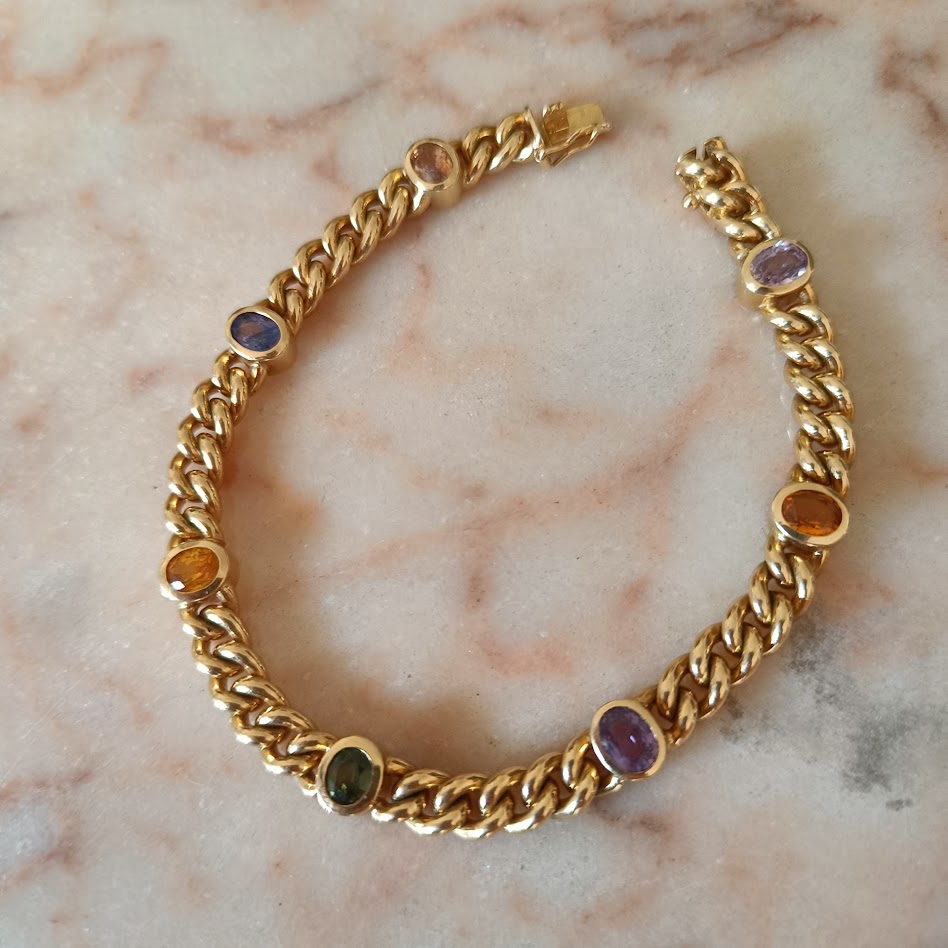 Gold chain bracelet with gemstones 